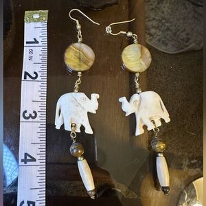 Elephant earrings.  Cream and brown beads with gold accents